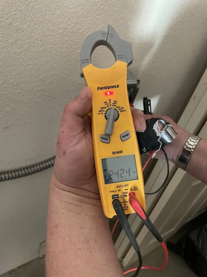 Voltage testing with clamp meter during Outlet Installation in Warrenton